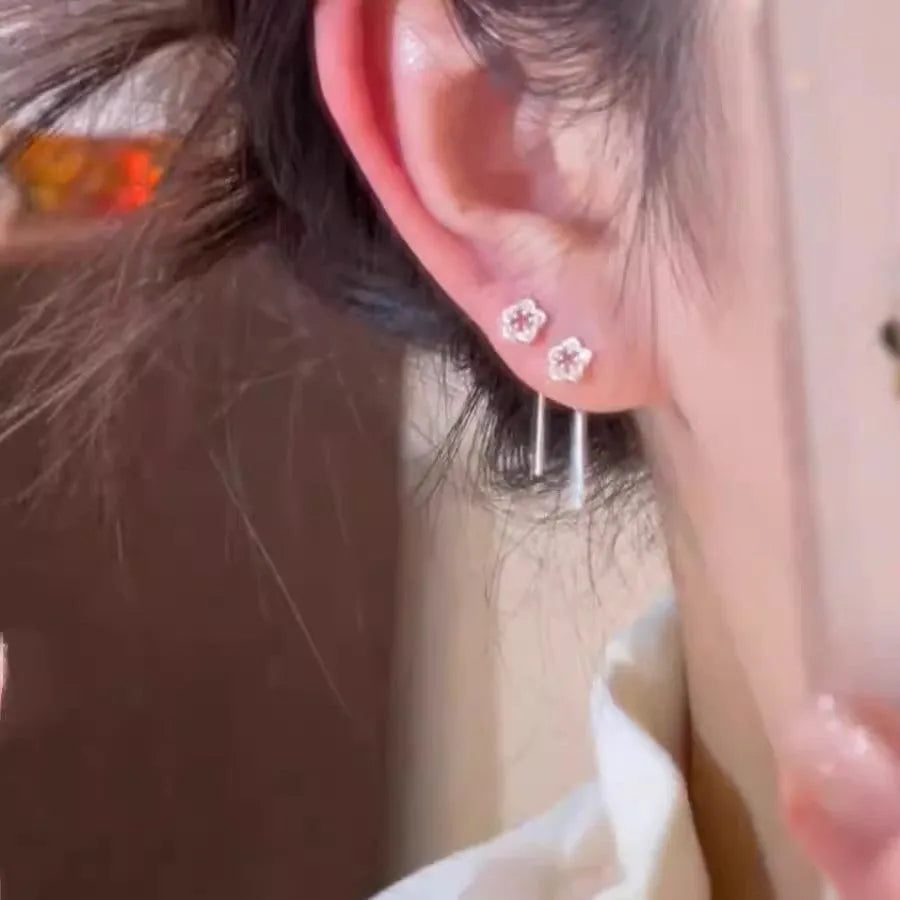 Sterling silver hollow flower dangling earrings with needle posts, silver floral alloy jewellery