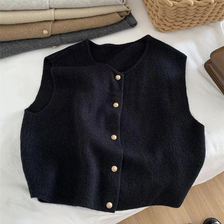 Women's polyester pullover vest with half sleeves in smoky grey, available in medium and large sizes by weight