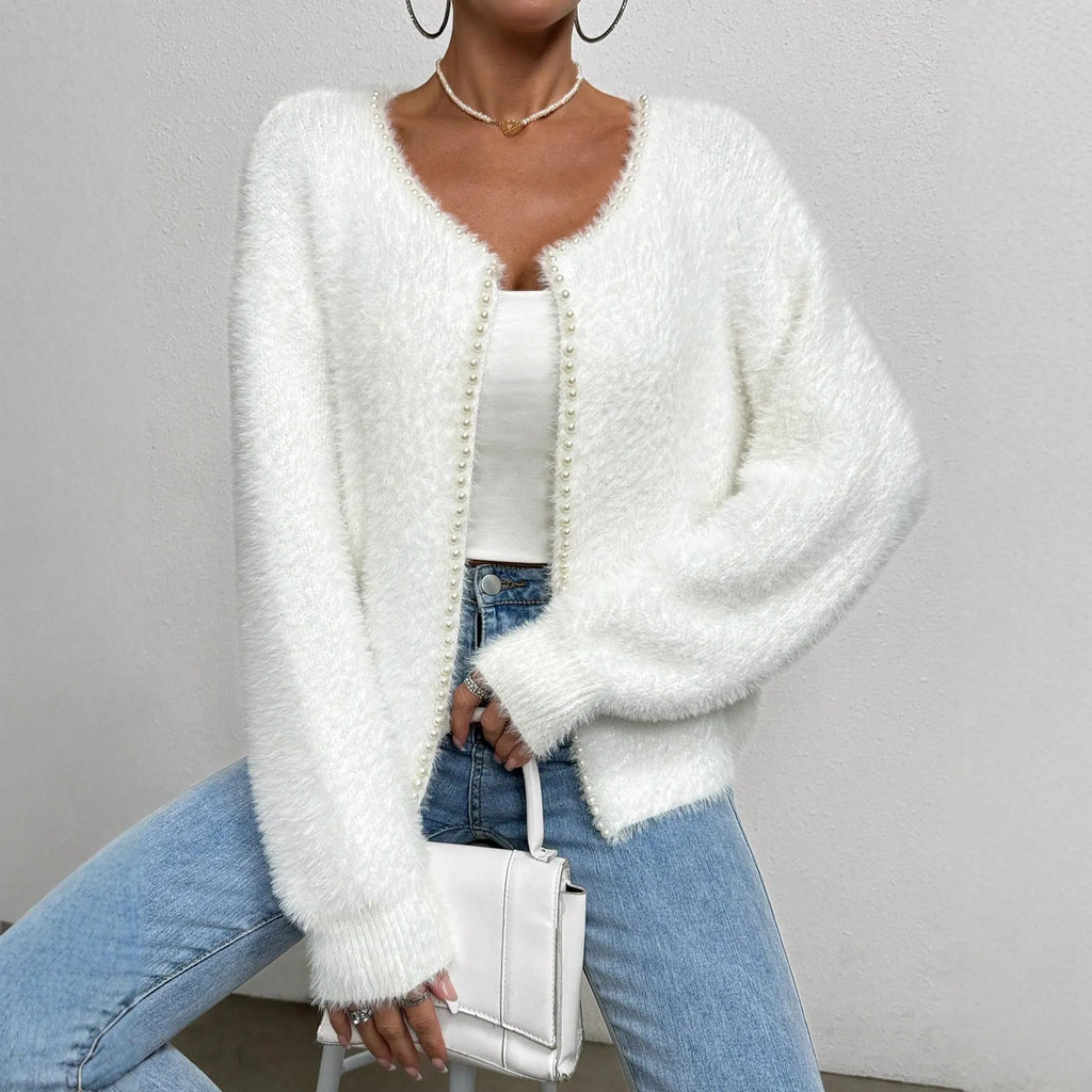 Women's white V-neck cardigan sweater with medium thickness polyester construction
