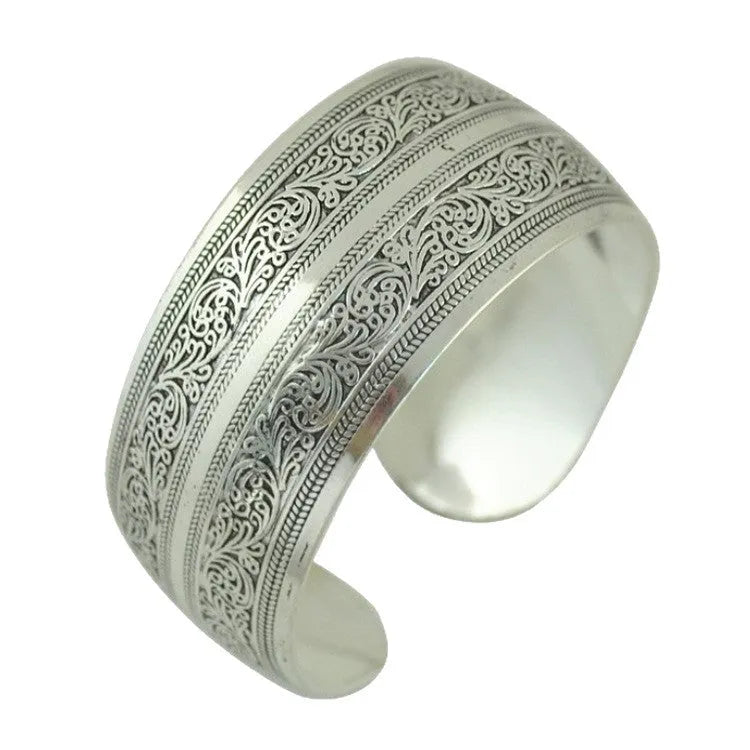 Ethnic carved open Miao silver bracelet in alloy with elephant or turtle colour finish