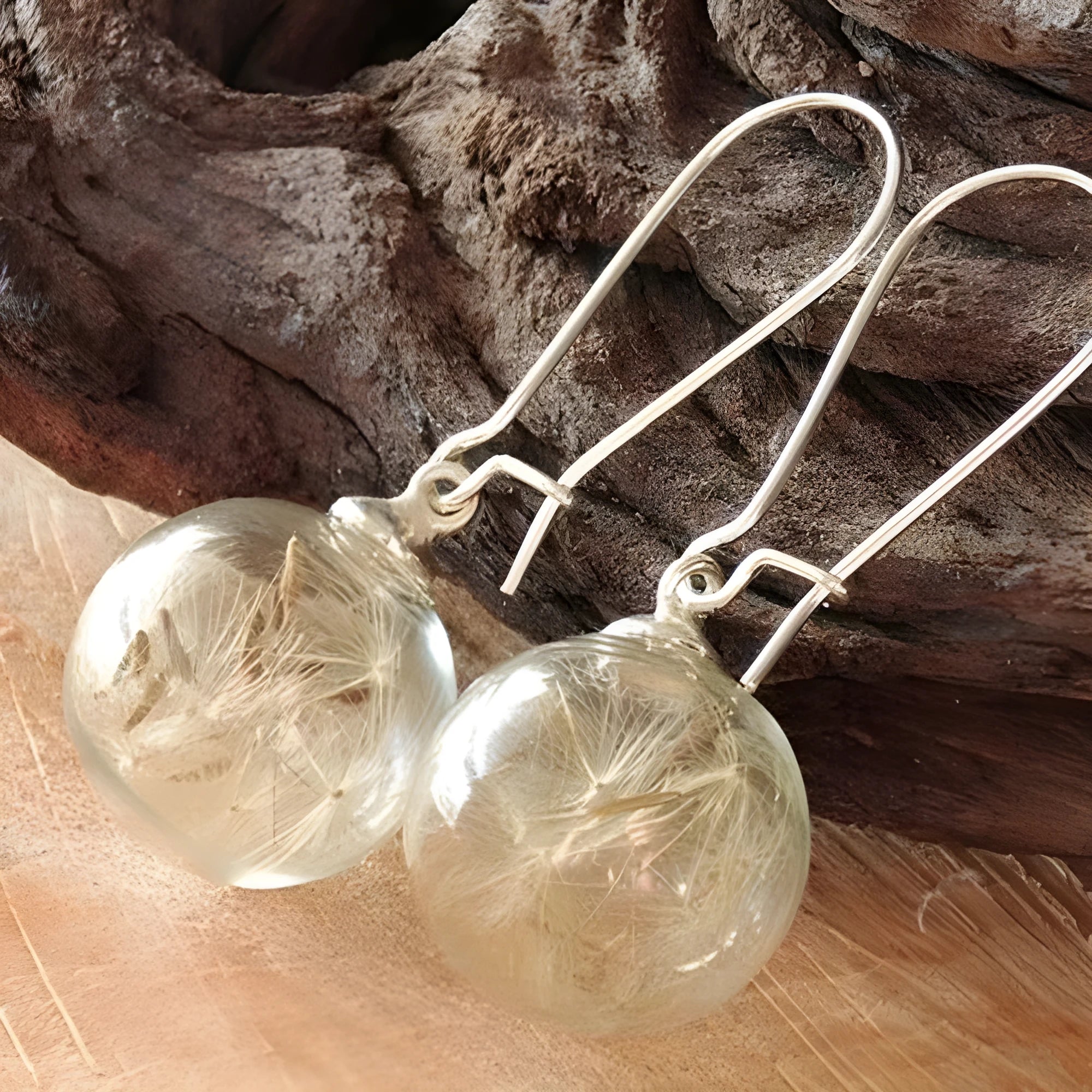 Transparent 16mm glass ball earrings with crystal dandelion seed design on silver French hooks