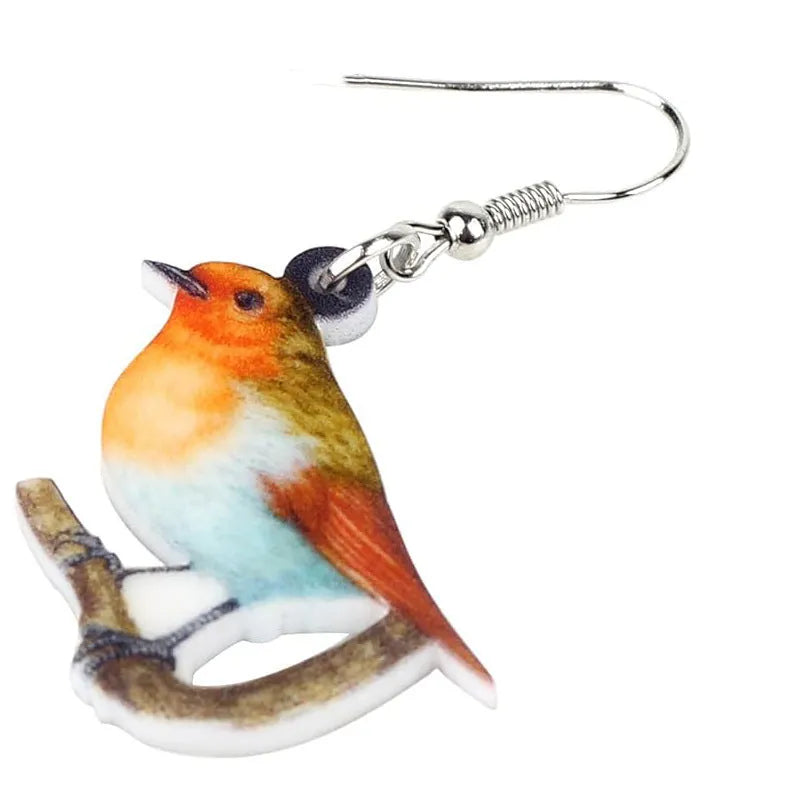 A pair of blue titmouse design pendant earrings made from printed acrylic on a geometric shape.