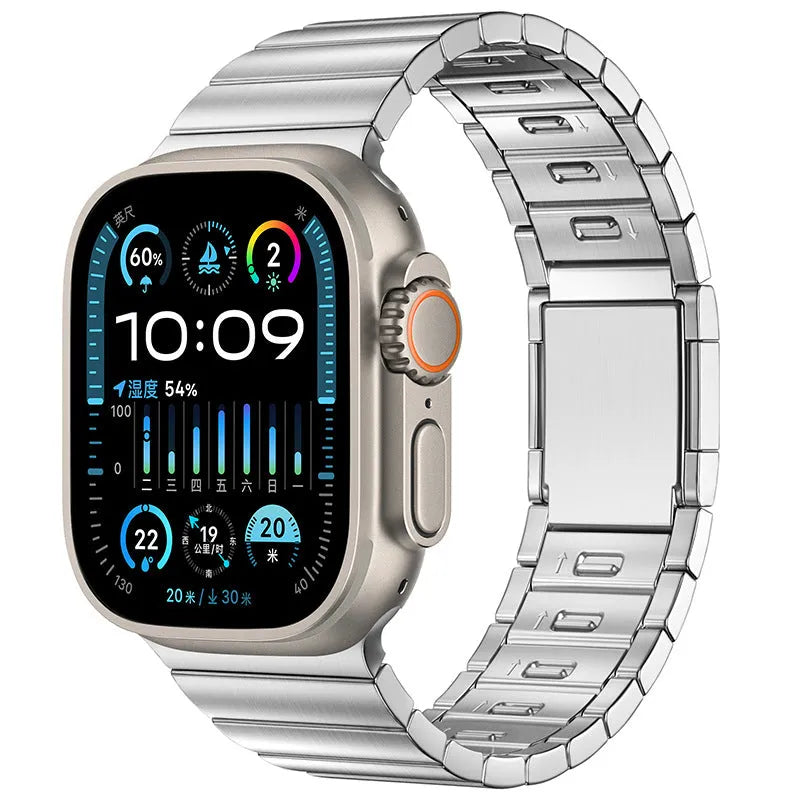 Stainless steel Apple Watch strap with magnetic buckle in multiple colour options on a wrist.