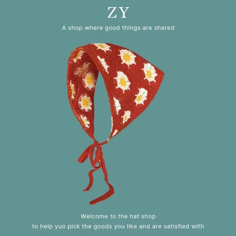 Women's cotton triangular headscarf with floral pattern, shown in beige blue little daisy design.