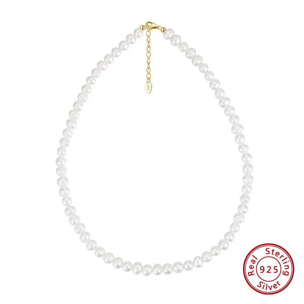 Women's silver adjustable necklace with a single natural freshwater pearl centre.
