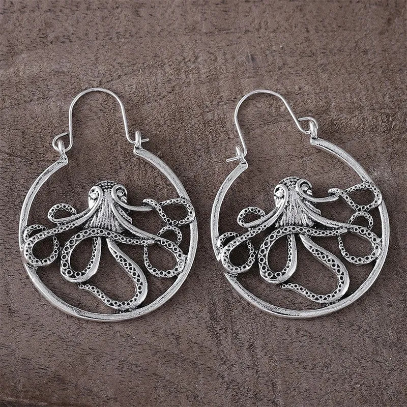 Vintage style octopus drop earrings in antique silver colour with detailed tentacle design