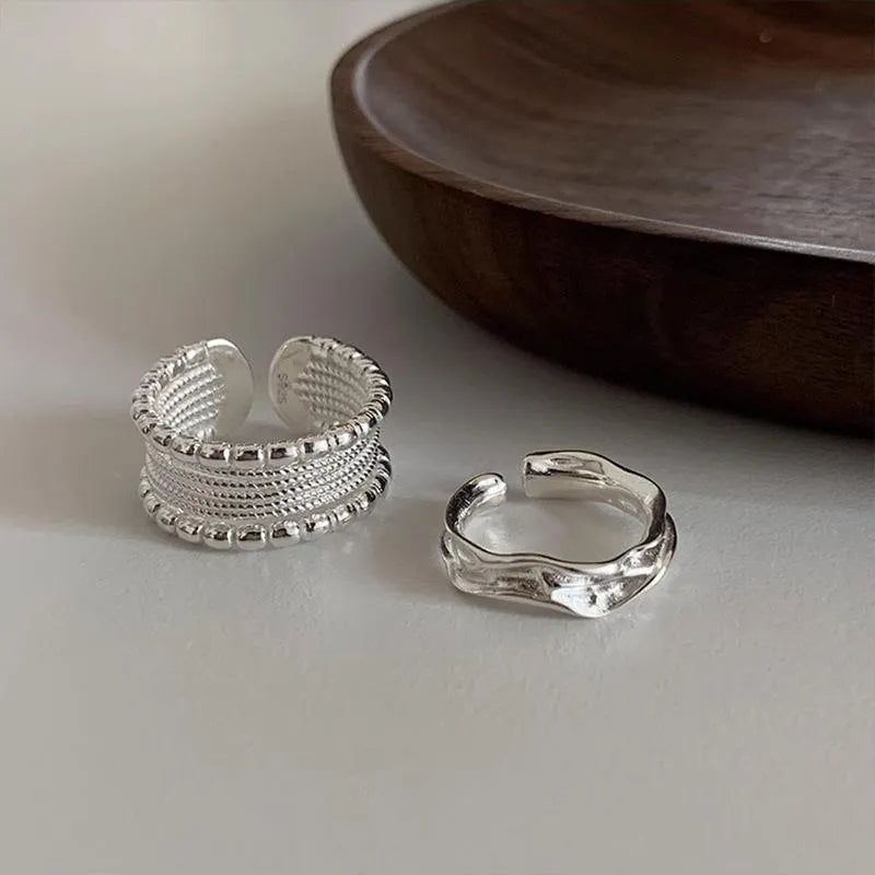 Copper alloy adjustable ring with geometric woven multilayer design