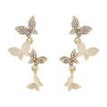 Women's butterfly copper drop earrings with gold finish for pierced ears