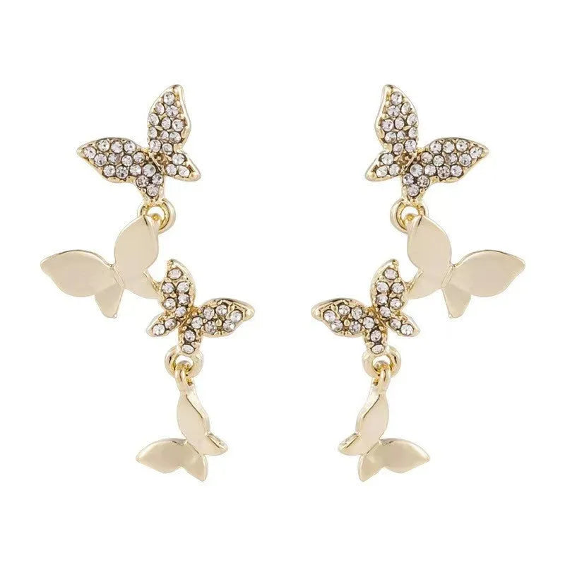 Women's butterfly copper drop earrings with gold finish for pierced ears