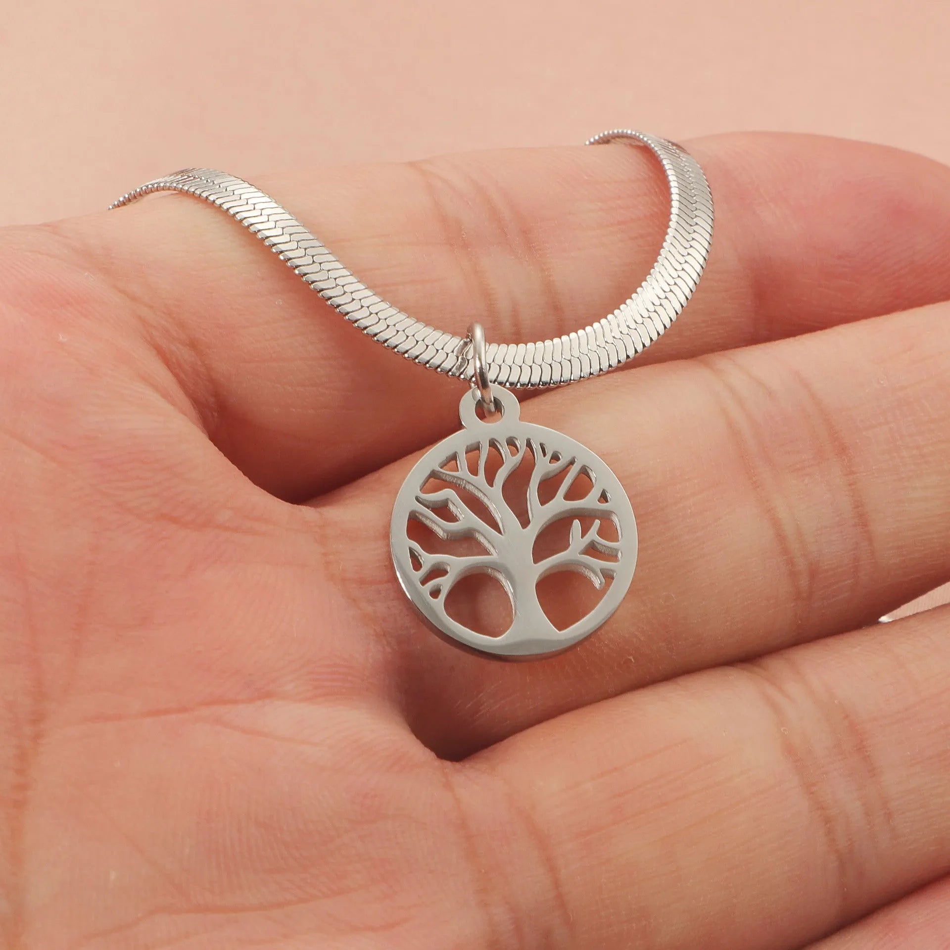 Adjustable tree pendant necklace on snake bone chain in gold or steel colour