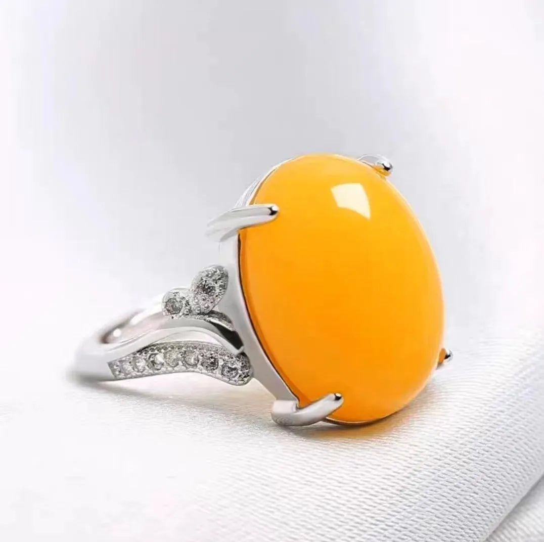 Geometric ethnic-style adjustable ring with a natural sapphire stone in one of five colours.