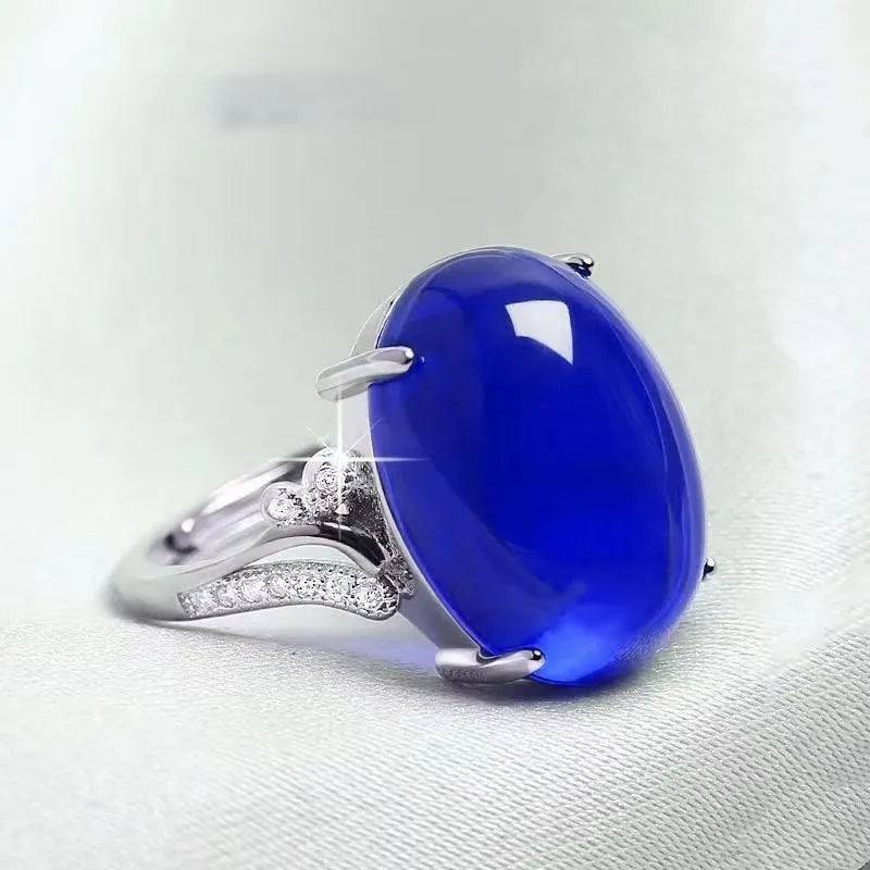 Geometric ethnic-style adjustable ring with a natural sapphire stone in one of five colours.