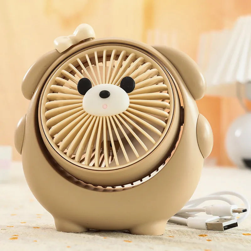 Cute dog-themed USB desktop electric fan on a desk, showing brown puppy colour variant.