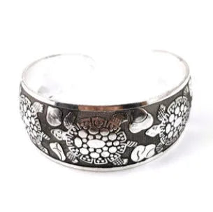 Ethnic carved open Miao silver bracelet in alloy with elephant or turtle colour finish