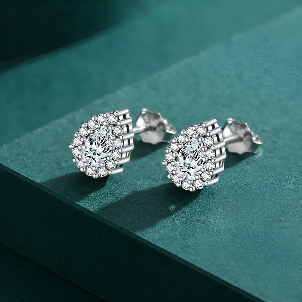 Women's silver drop ear studs with 925 sterling silver and diamond treatment process