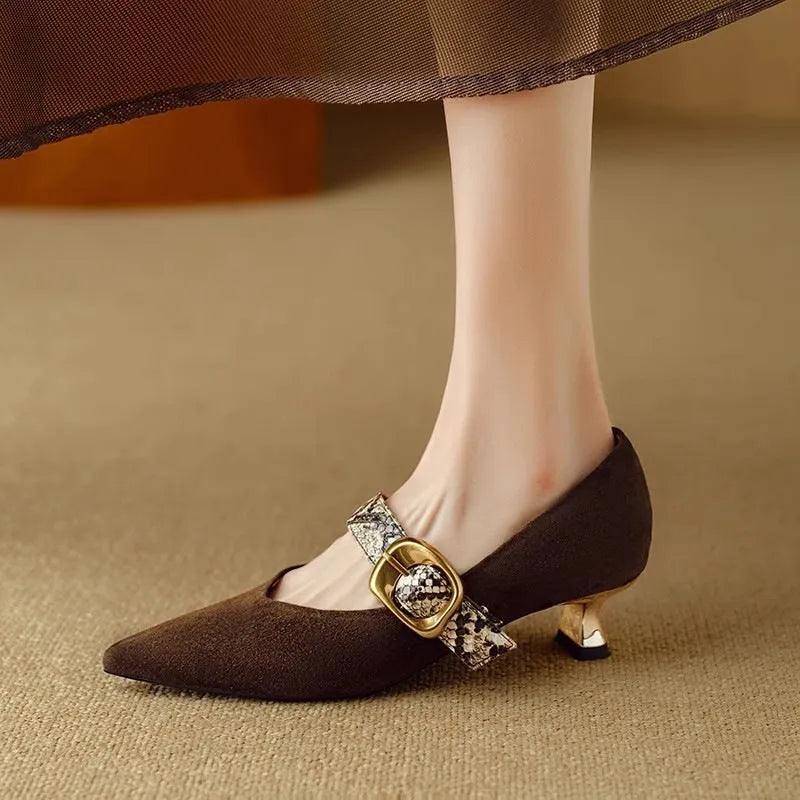Women's black stiletto high heels with French pointed toe and buckle closure