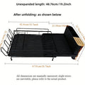 Retractable carbon steel kitchen dish drain rack for knives and forks on a countertop.
