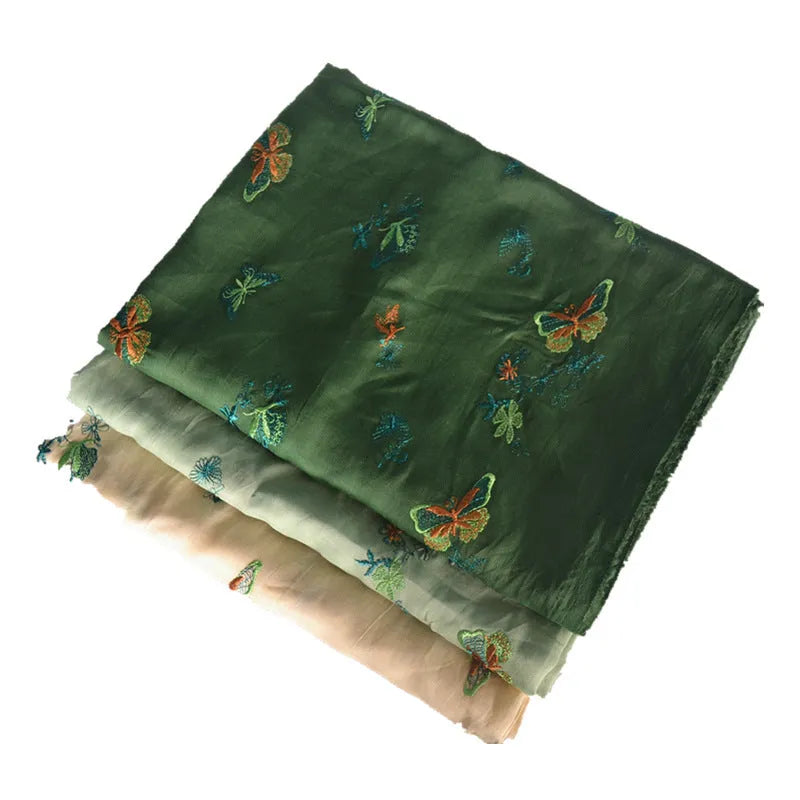 100% ramie embroidery fabric showing texture in beige, dark green and grass green colours