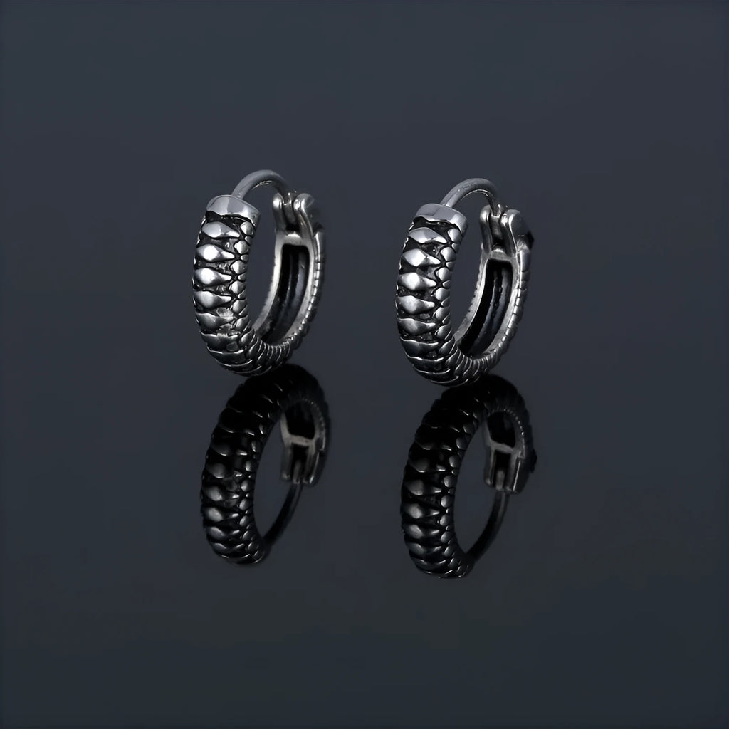 Silver geometric retro twist earrings with stripe detail, made from titanium steel.