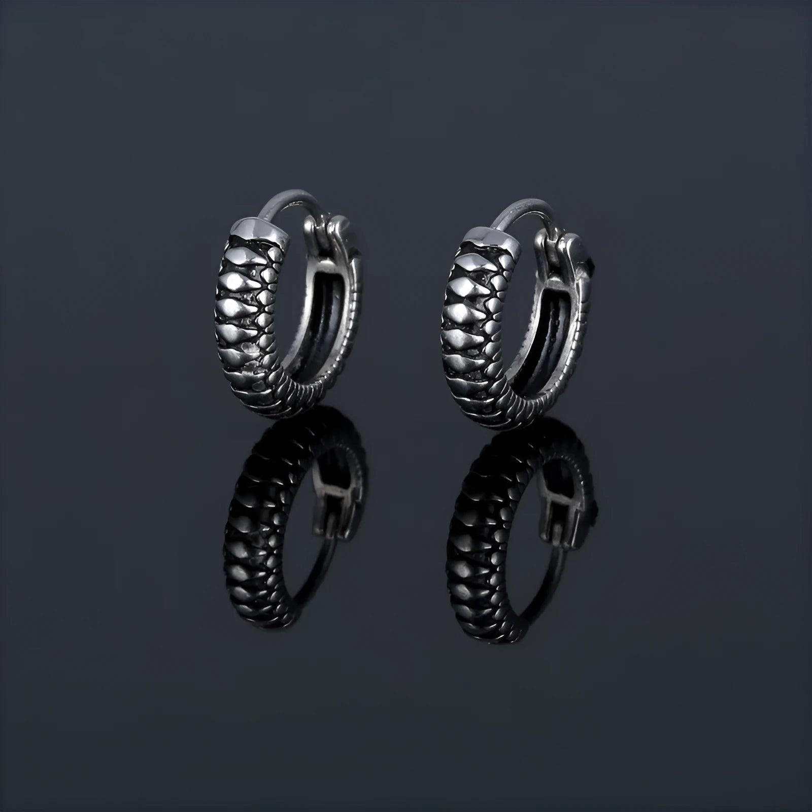 Silver geometric retro twist earrings with stripe detail, made from titanium steel.