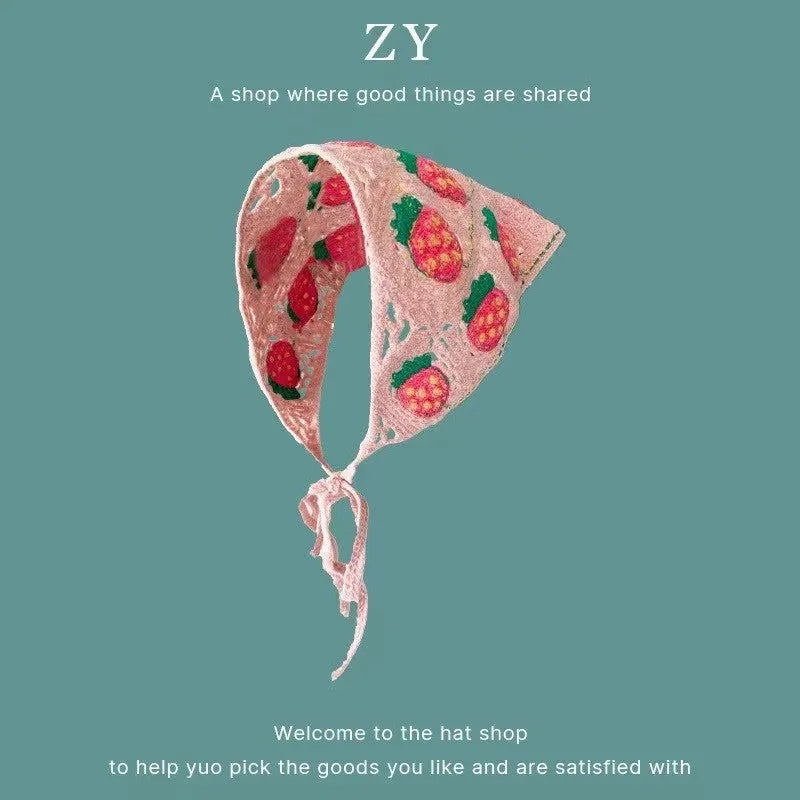Women's cotton triangular headscarf with floral pattern, shown in beige blue little daisy design.