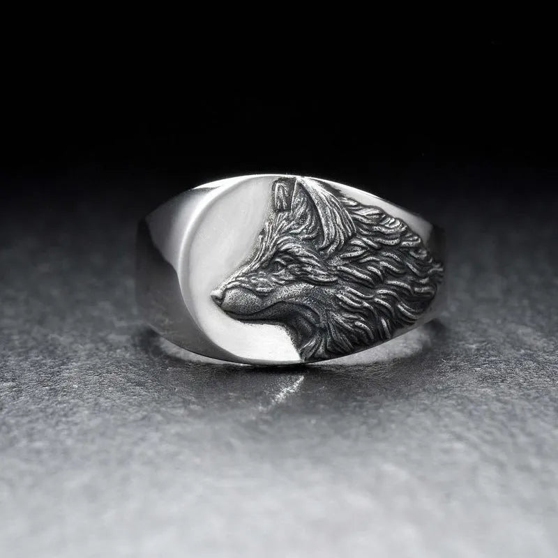 Men's silver geometric wolf ring with retro design on size chart showing UK 6-12 measurements