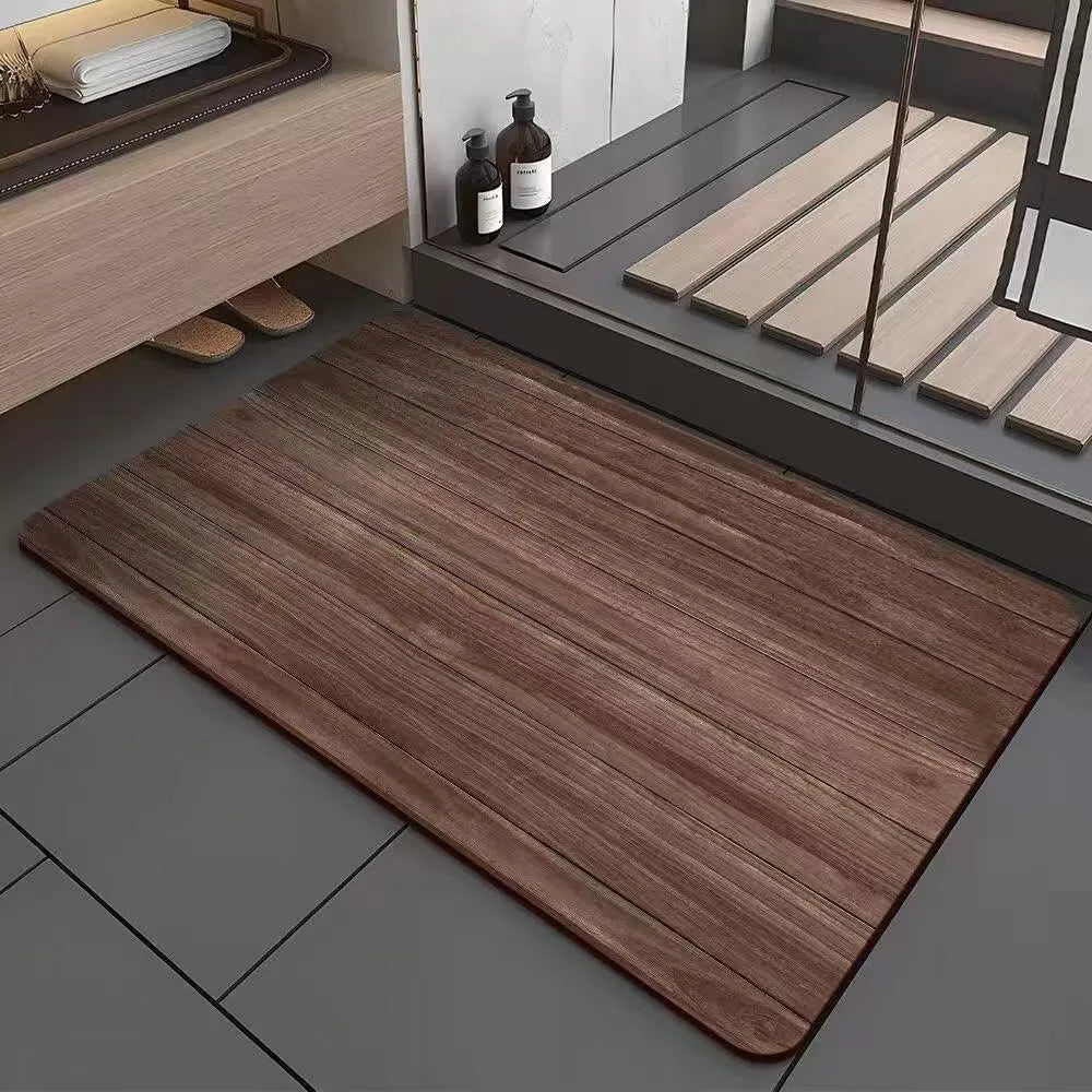 Square diatom ooze floor mat with geometric wood grain pattern in a bathroom setting.
