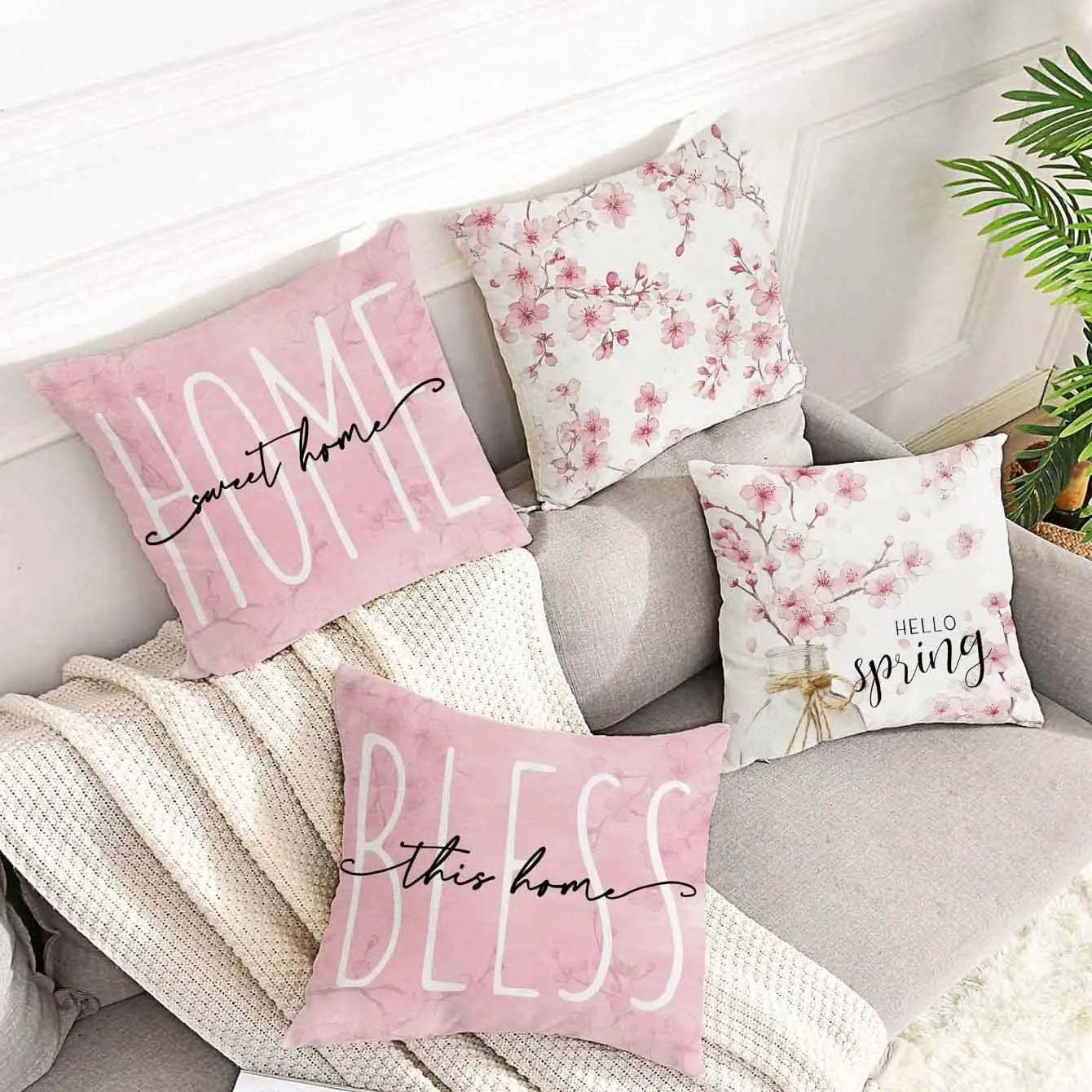 Short velvet cushion cover with cherry blossom and letter print in 45cm square size.