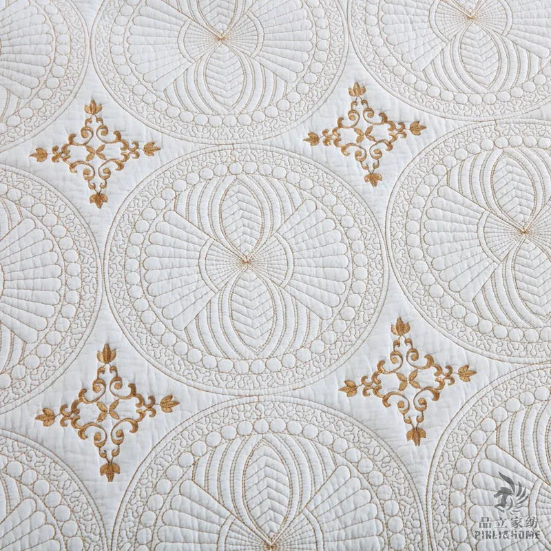 European-style cotton embroidered bedspread and pillowcase set on a 1.8 metre bed.