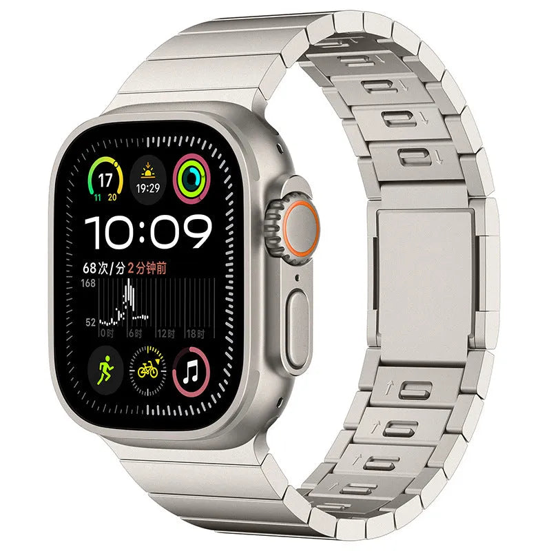 Stainless steel Apple Watch strap with magnetic buckle in multiple colour options on a wrist.