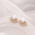 Women's retro fan-shaped alloy earrings with silver stud finish and opal rhinestone detail.