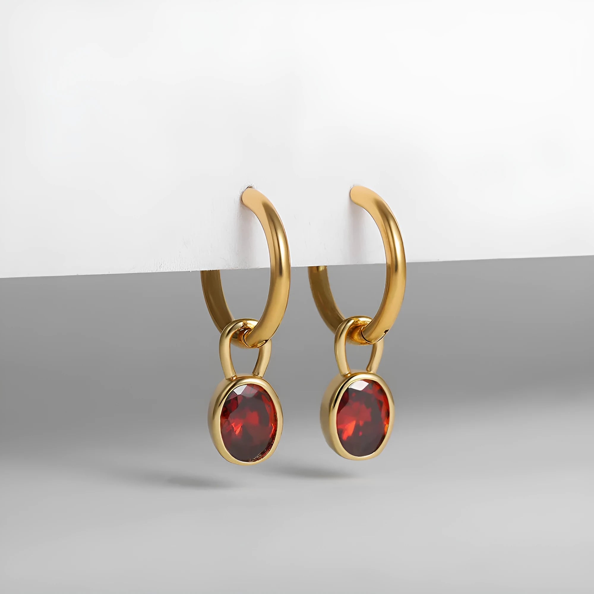 Women's oval zircon earrings in six colours with copper alloy setting and retro styling