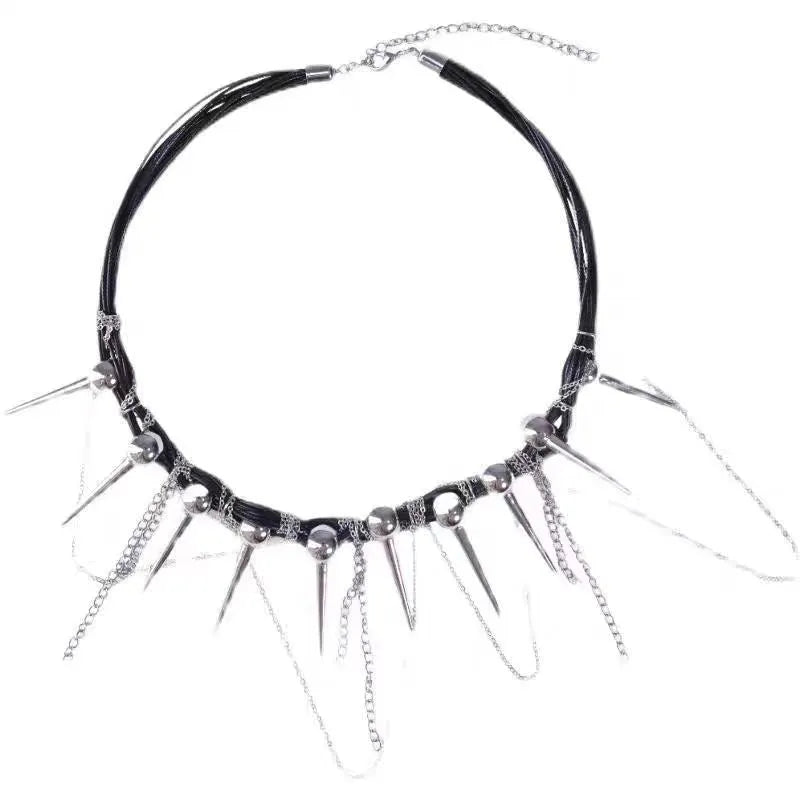 Women's leather necklace with round beads, a winding tassel, and metallic point rivets.