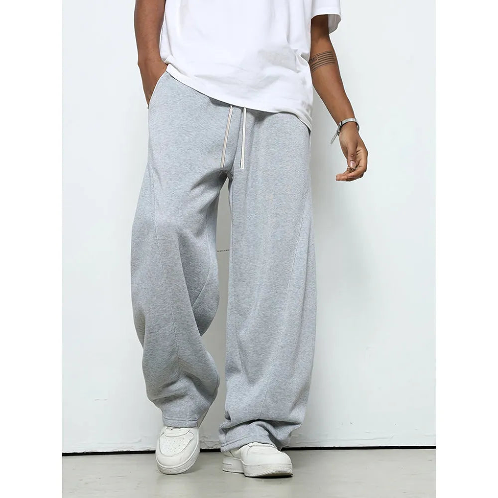 Men's straight-leg casual trousers with elastic waist in black, dark grey, and light grey colours