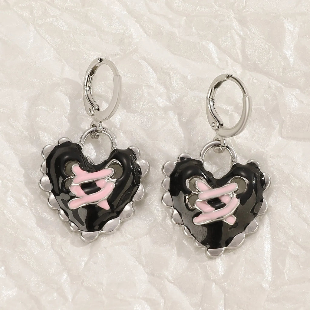 Women's alloy earrings with crystal cross designs in five colour options including white, peach heart, and antique silver
