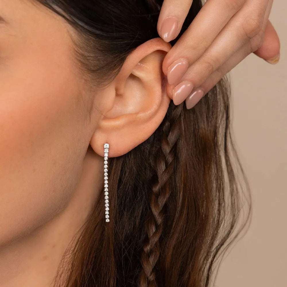 Women's geometric zircon earrings with Chinese style linear elements in gold or steel colour