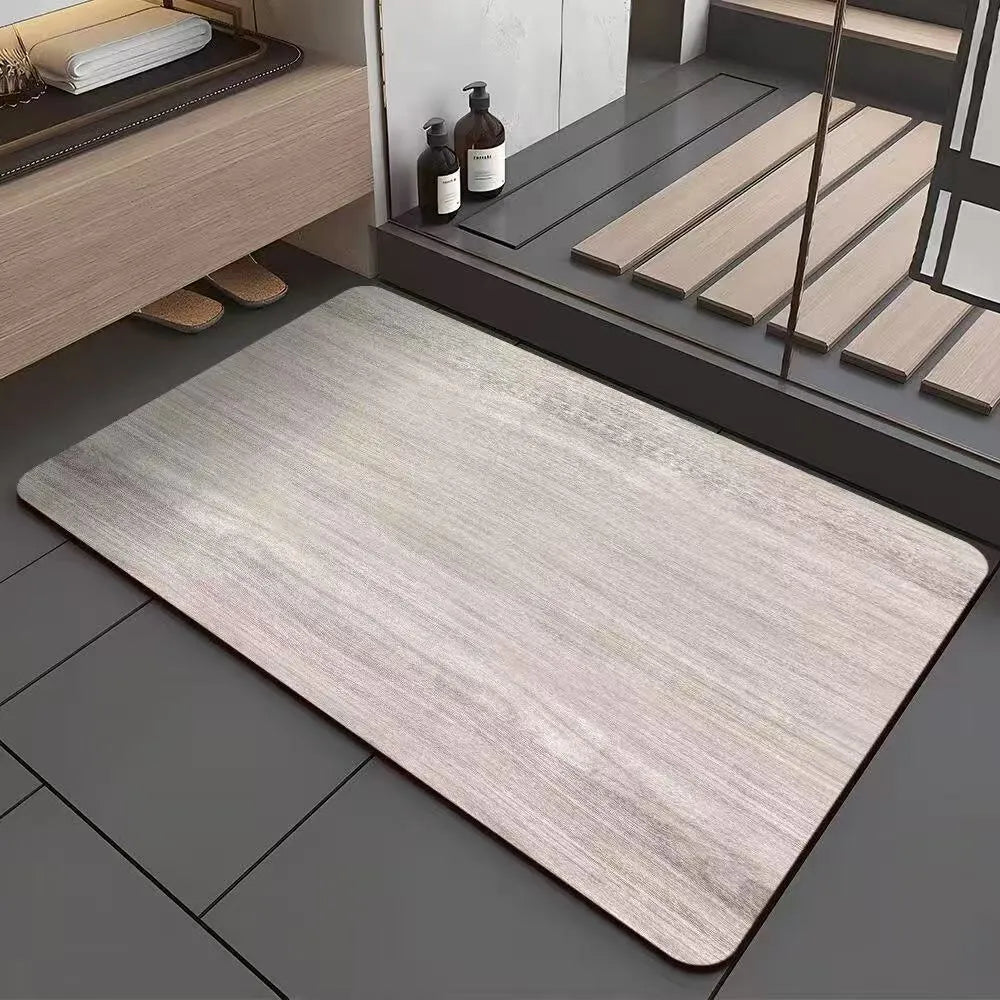 Square diatom ooze floor mat with geometric wood grain pattern in a bathroom setting.