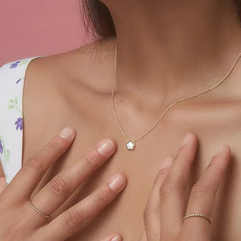 Mother of pearl shell flower necklace with gold or silver finish on O-shaped chain