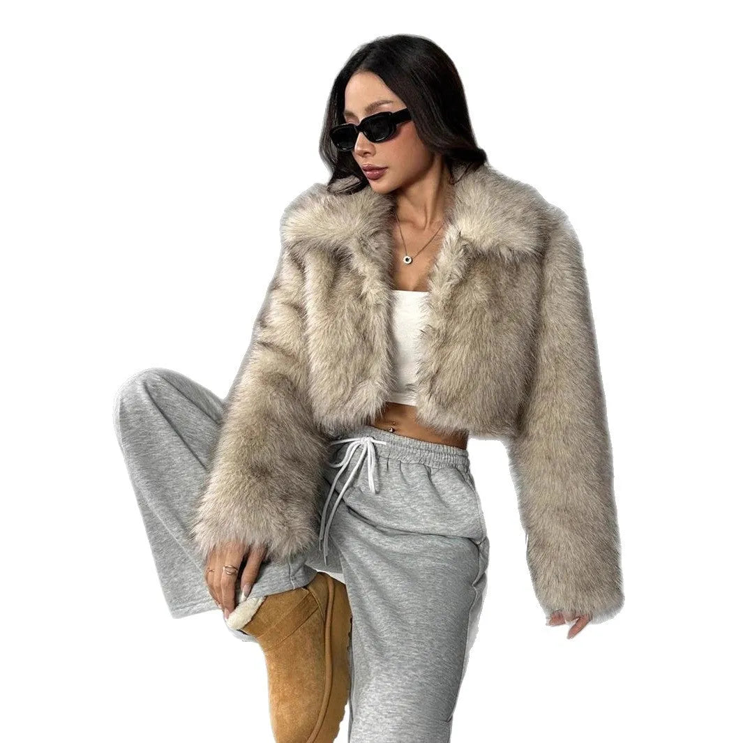 Women's faux fur coat with fur collar in black tip on black background colour