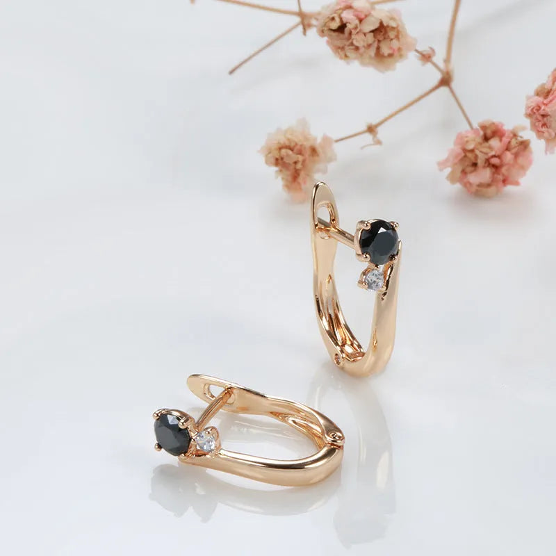 Gold retro geometric drop earrings for women with a gemstone inlay.