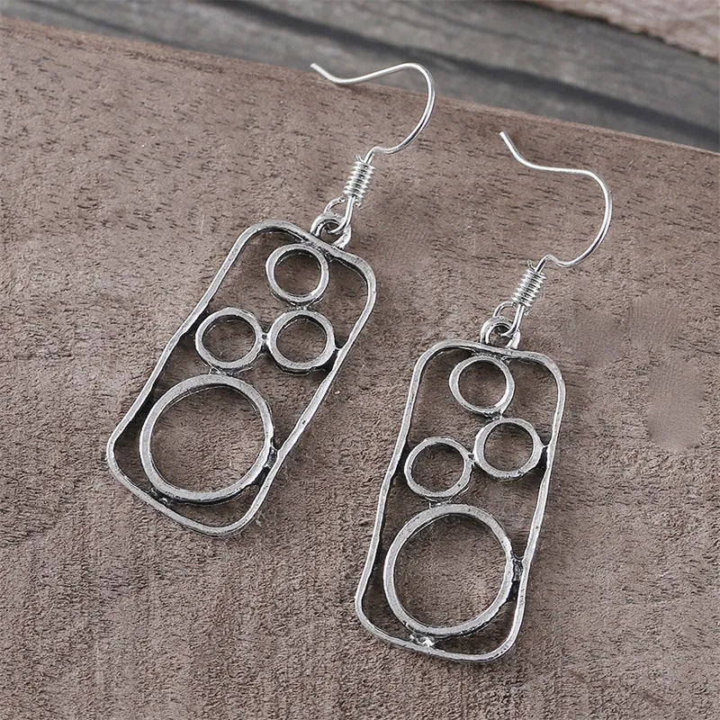 Geometric irregular square earrings within circular ring, antique silver finish on zinc alloy