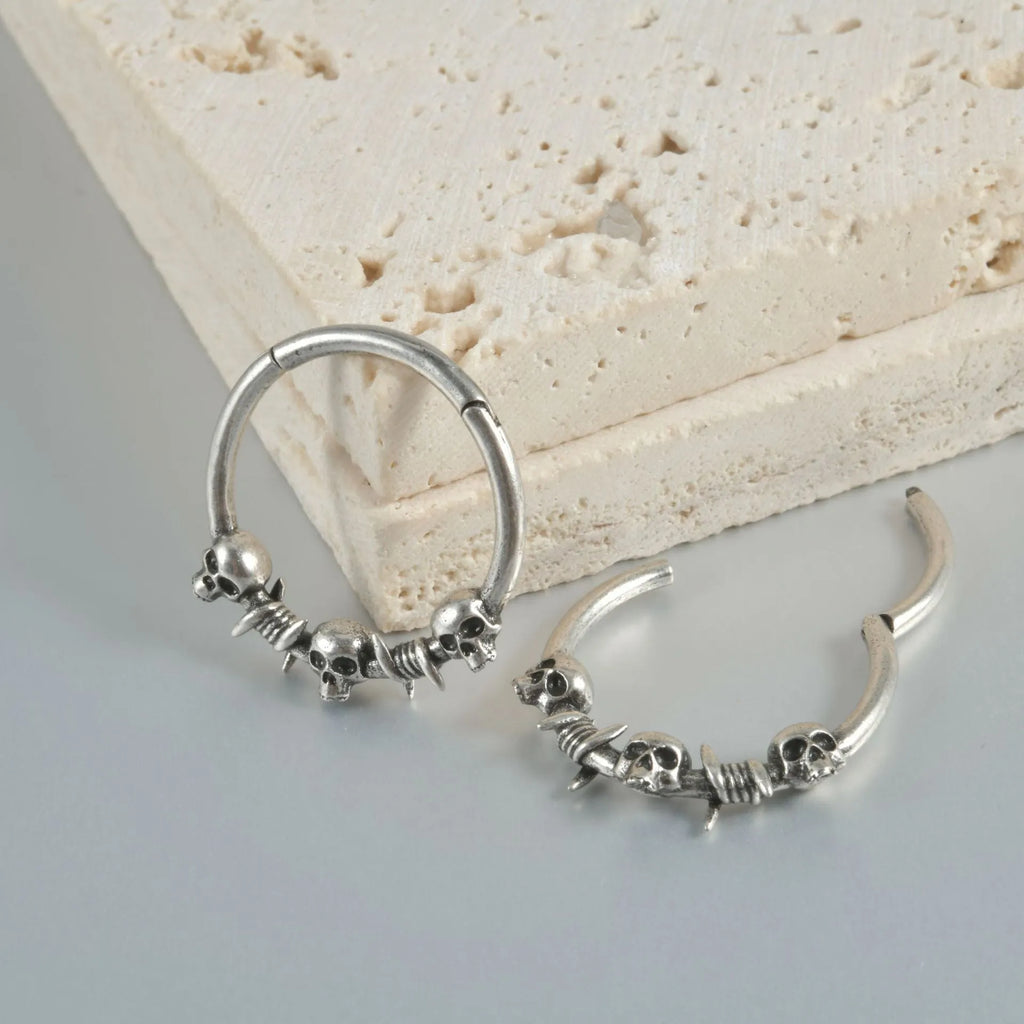 Copper punk earrings with antique silver finish and ghost head design