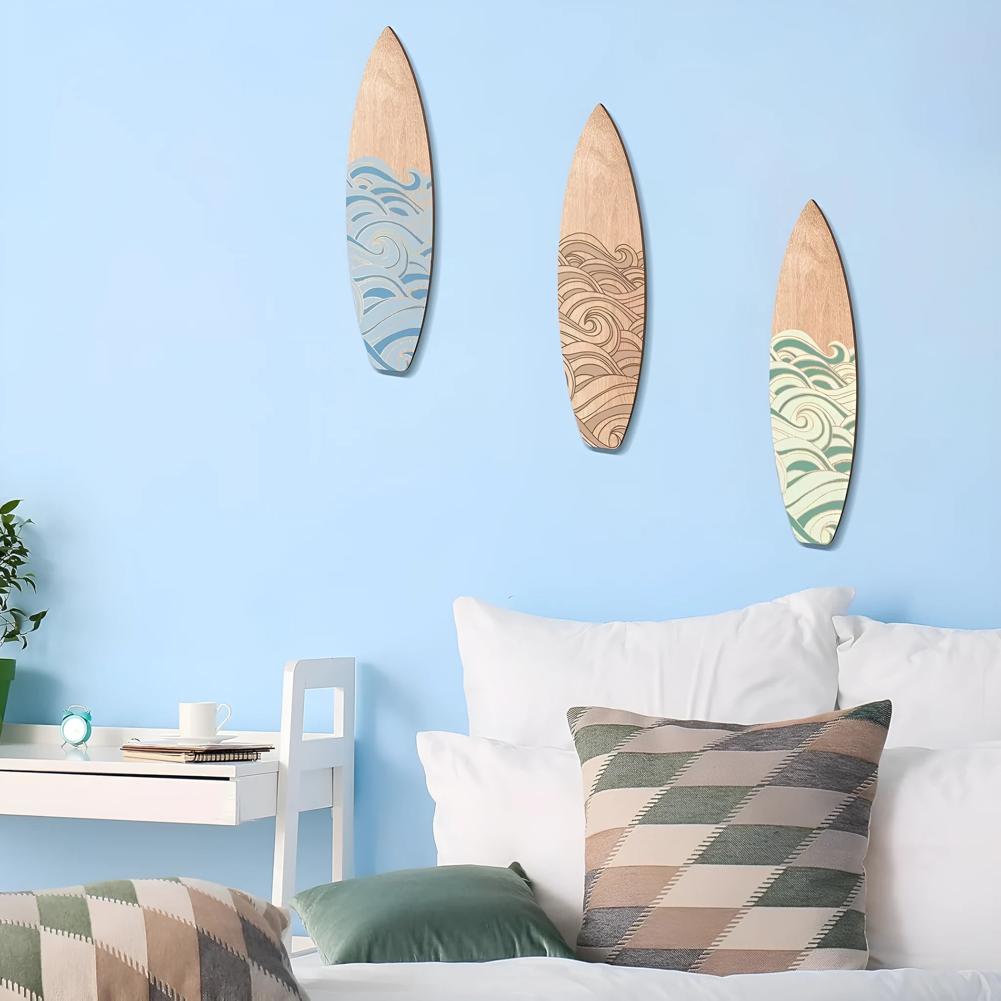 Three identical wooden surfboard-shaped wall decorations on a white background.