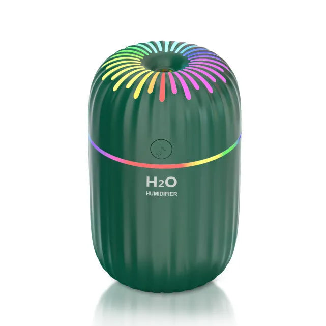 Small green animal-shaped USB aromatherapy humidifier with compact plastic build.