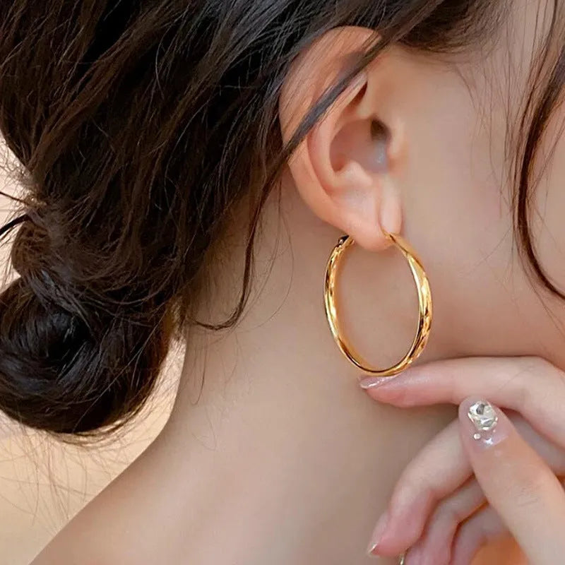 Gold and silver 40mm metal circle earrings with electroplated copper construction
