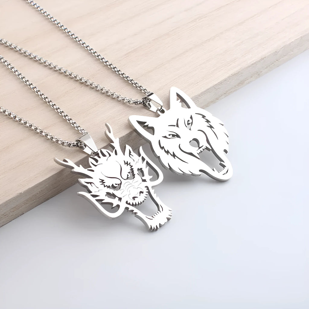 Hollow wolf head stainless steel pendant necklace with polished finish and 60cm chain on neutral background