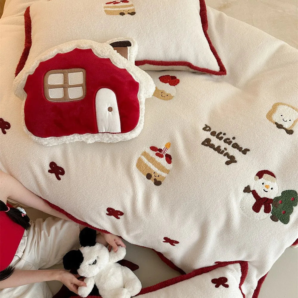Cartoon winter Christmas bedding four-piece set with Xuefu Milk Pastry pattern, showing duvet cover, sheet, and pillowcases made from polyester.