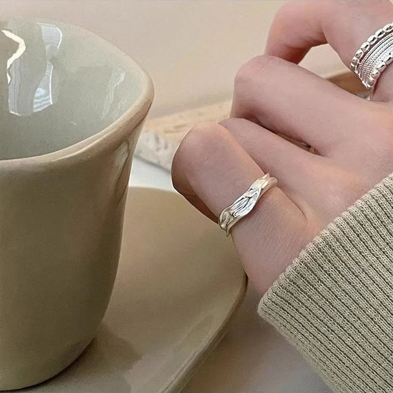 Copper alloy adjustable ring with geometric woven multilayer design