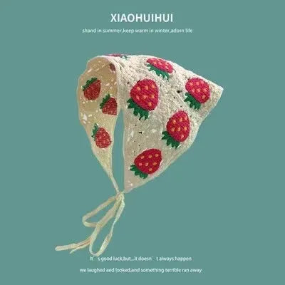Women's cotton triangular headscarf with floral pattern, shown in beige blue little daisy design.