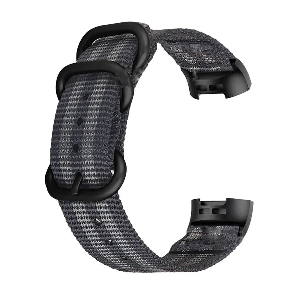Nylon three-ring buckle replacement strap for Fitbit Charge 3 fitness tracker in multiple colours.